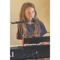 13-year-old Gryff, from Briar Hill, is a local singer/songwriter who regularly busks around Nillumbik and has been singing since he was 5 years old.