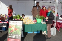 Deb and Andrew Stahmer sold lemons, tamarillos and herbs (the person on the right of the photo is a photo bomber).